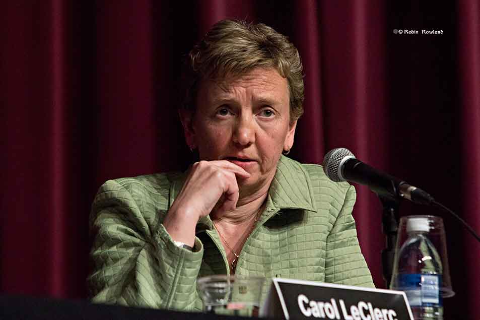 Carol Leclerc listens to question