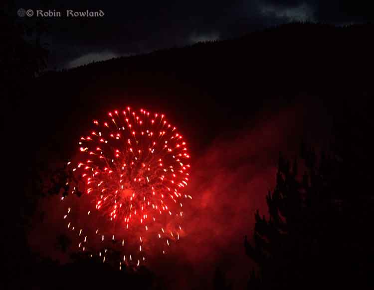 Fireworks in front of mountains