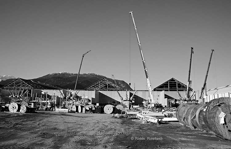 Electrical equipment  with the new potlines in the background  Robin Rowland photo